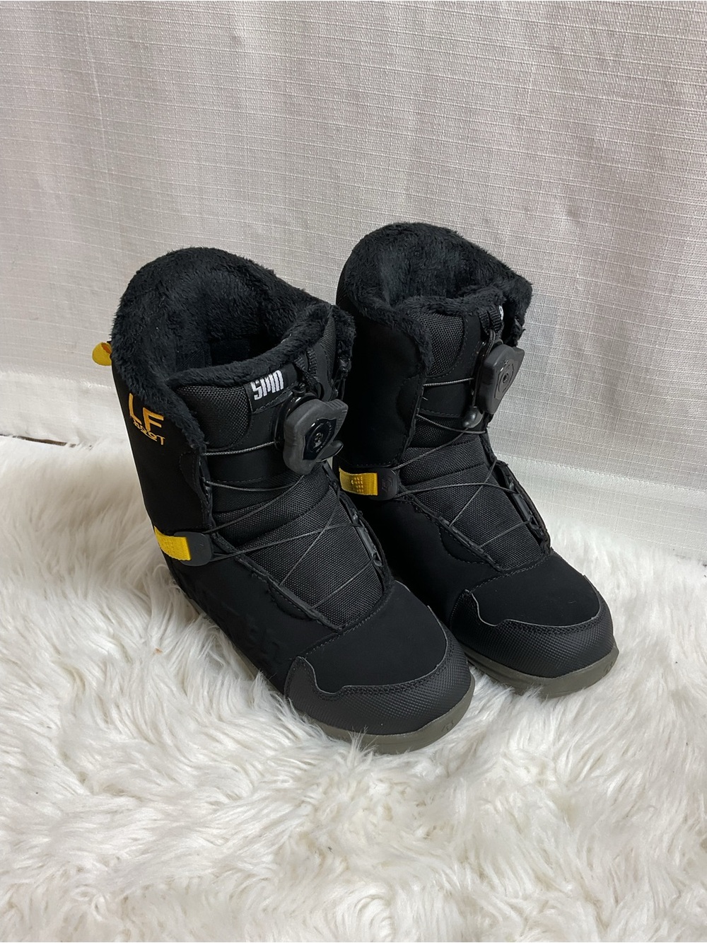 Kids Black Snow Boots with Quick-Pull Closure and Yellow Accent